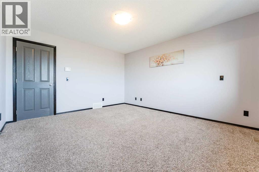 277 Panora Way NW, Calgary, Alberta  T3K 0T9 - Photo 20 - A2308416