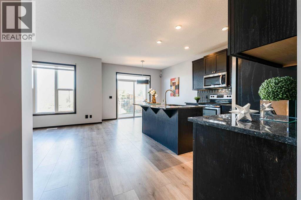 277 Panora Way NW, Calgary, Alberta  T3K 0T9 - Photo 5 - A2308416