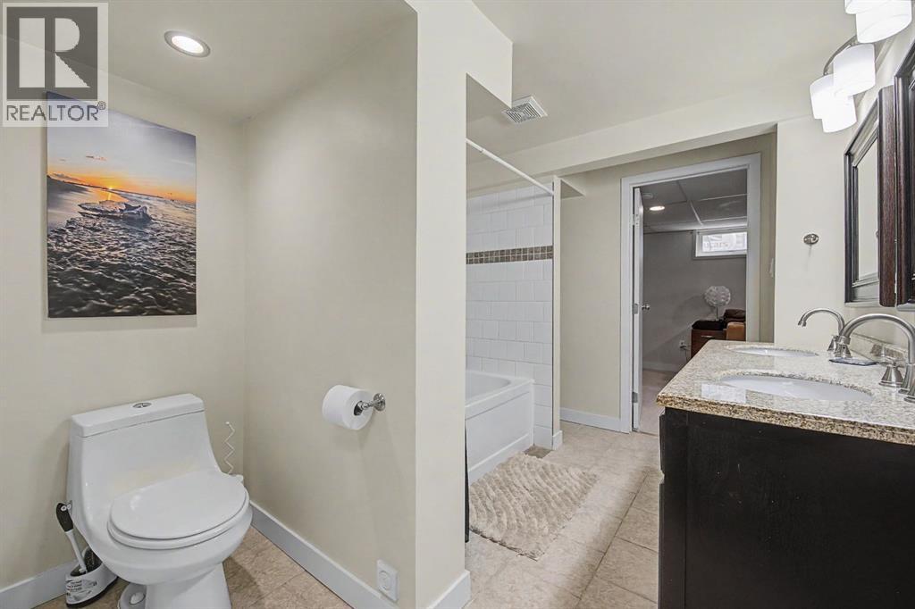359 Woodvale Crescent SW, Calgary, Alberta  T2W 3L3 - Photo 24 - A2307643