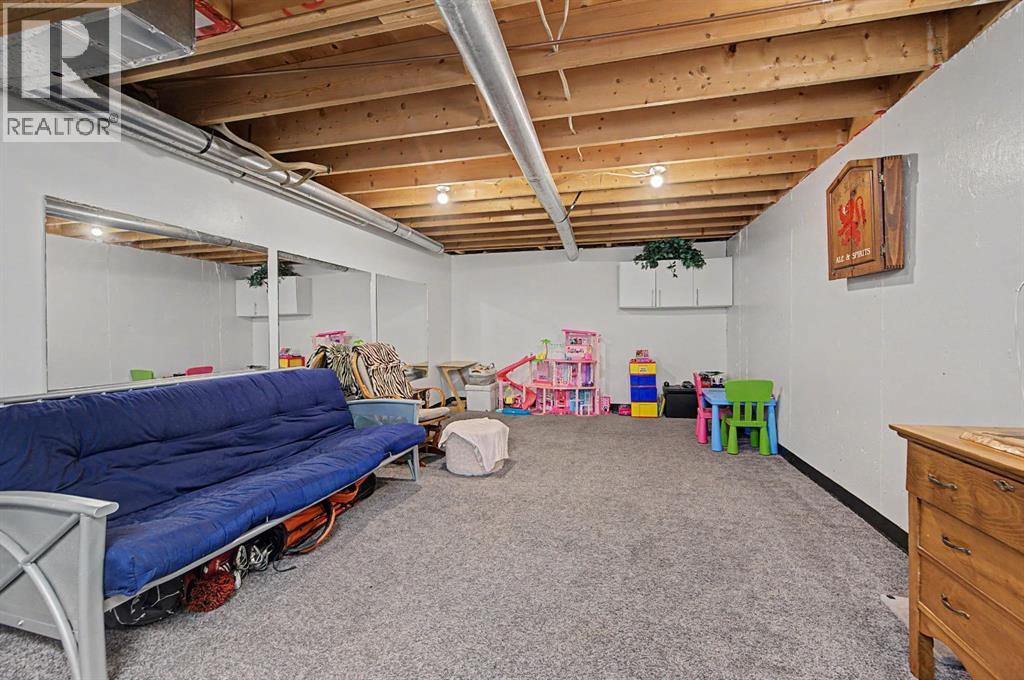 359 Woodvale Crescent SW, Calgary, Alberta  T2W 3L3 - Photo 26 - A2307643