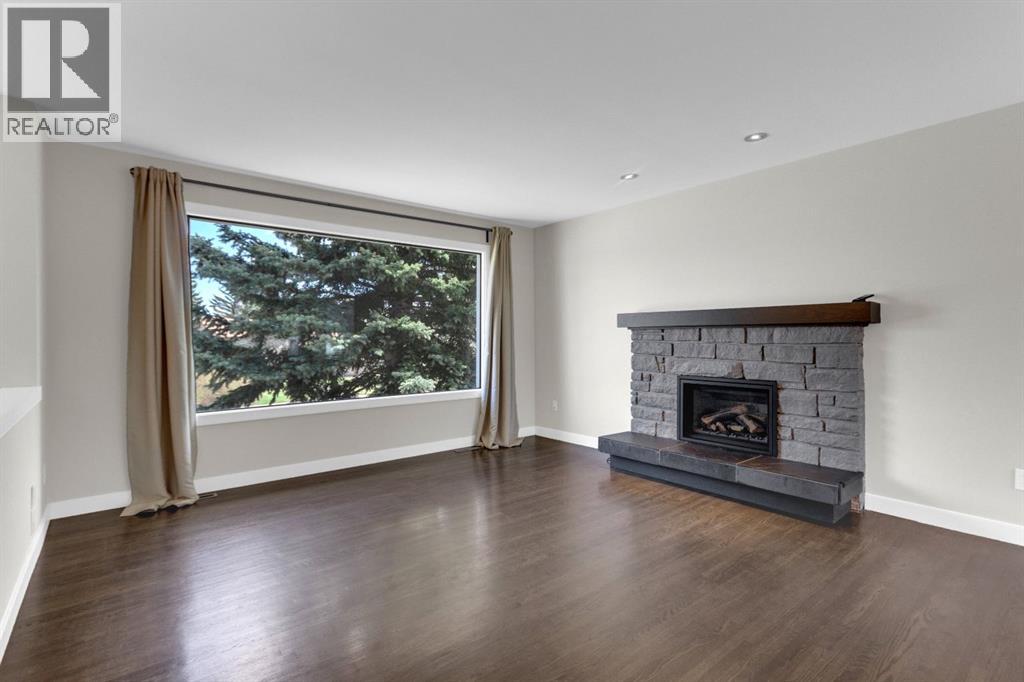 5615 Lakeview Drive SW, Calgary, Alberta  T3E 5S5 - Photo 3 - A2307492