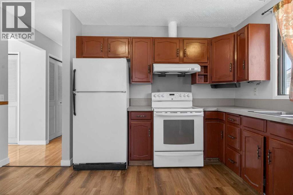 900 Abbeydale Drive NE, Calgary, Alberta  T2A 5Y1 - Photo 8 - A2307433