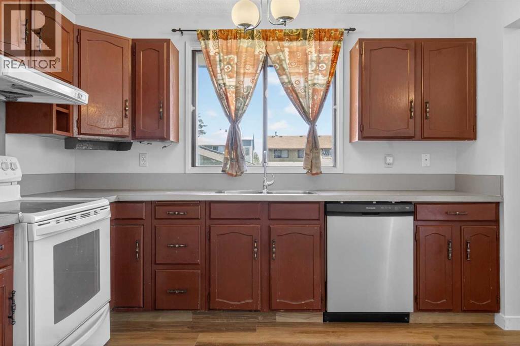 900 Abbeydale Drive NE, Calgary, Alberta  T2A 5Y1 - Photo 9 - A2307433