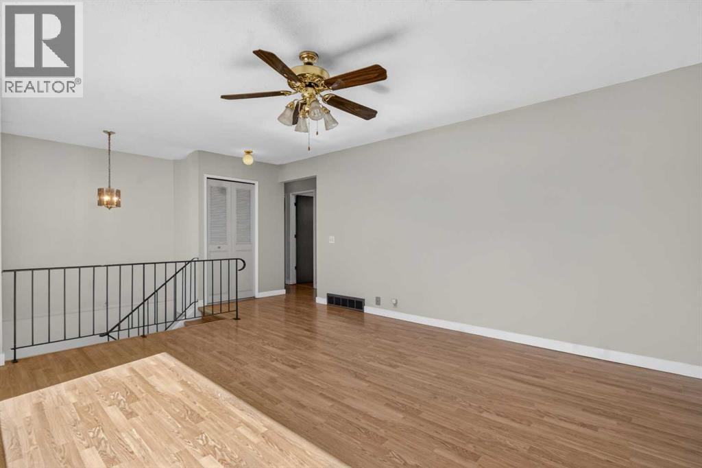 900 Abbeydale Drive NE, Calgary, Alberta  T2A 5Y1 - Photo 5 - A2307433