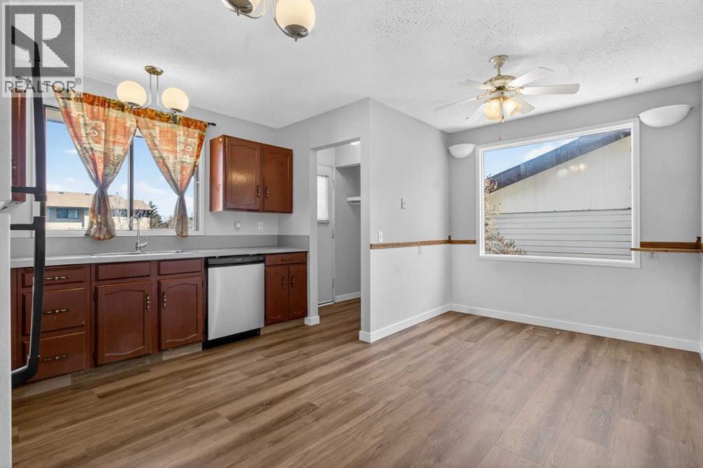 900 Abbeydale Drive NE, Calgary, Alberta  T2A 5Y1 - Photo 6 - A2307433