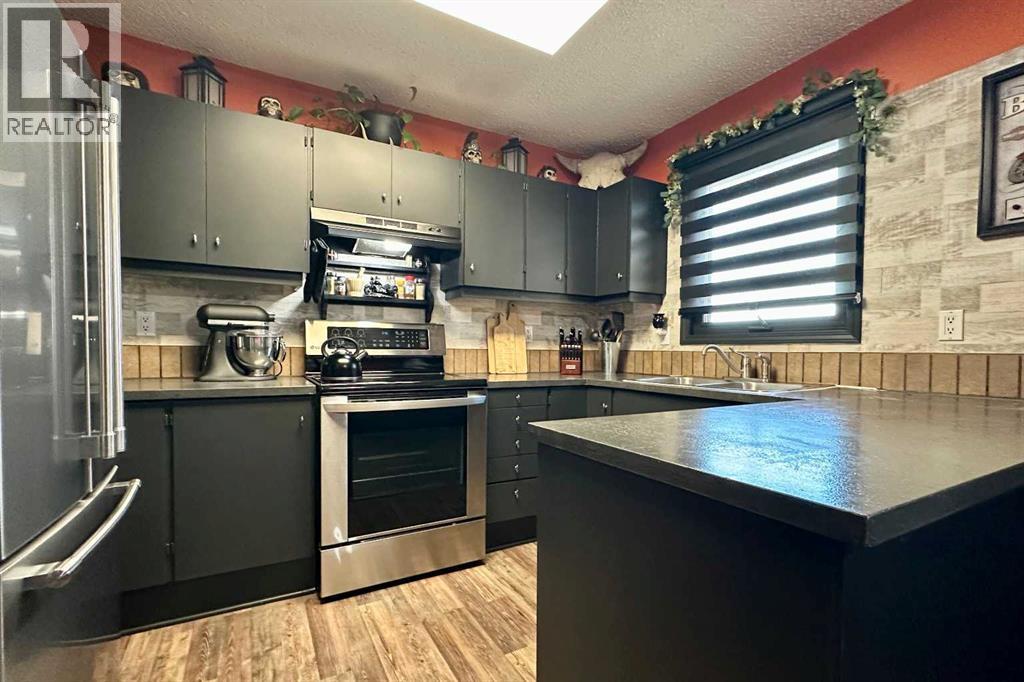 21 Pan Am Street, Swan Hills, Alberta  T0G 2C0 - Photo 12 - A2307724