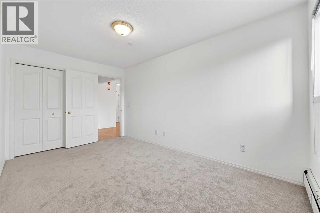 210, 165 Manora Place NE, Calgary, Alberta  T2A 7X5 - Photo 24 - A2278132
