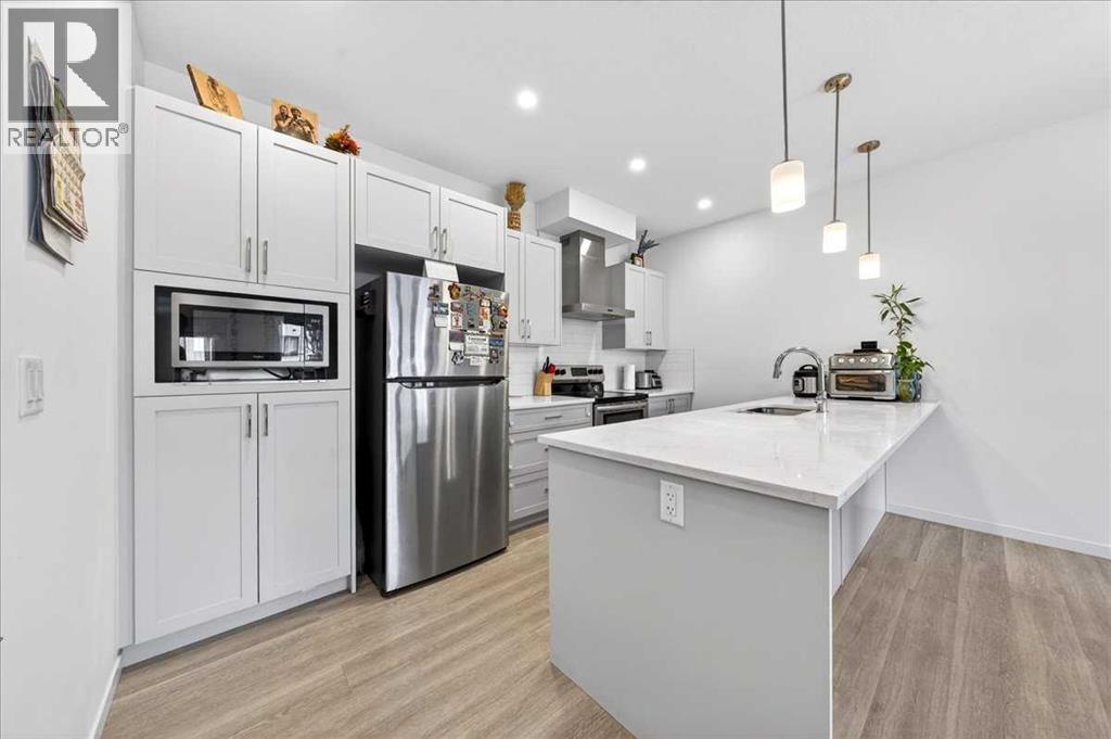 663 South Point Heath Sw, Airdrie, Alberta  T4B 5H7 - Photo 6 - A2307419