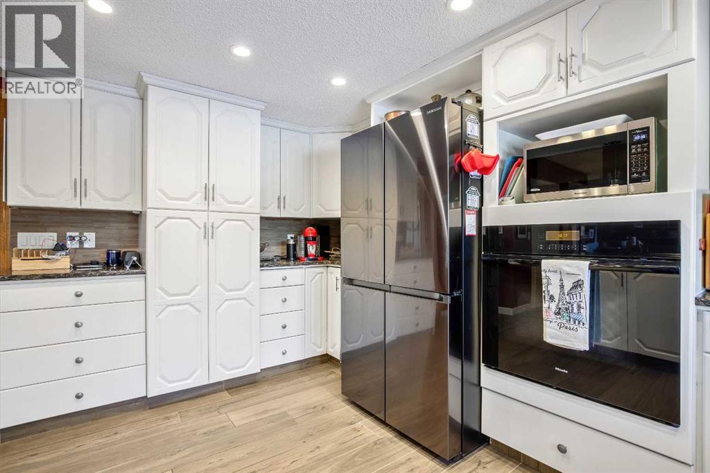 135 Canter Place SW, Calgary, Alberta  T2W 5M9 - Photo 10 - A2292964
