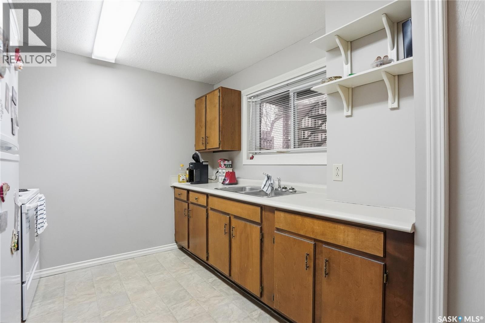 206 & 208 Coppermine Crescent, Saskatoon, Saskatchewan  S7K 4L7 - Photo 33 - SK035030