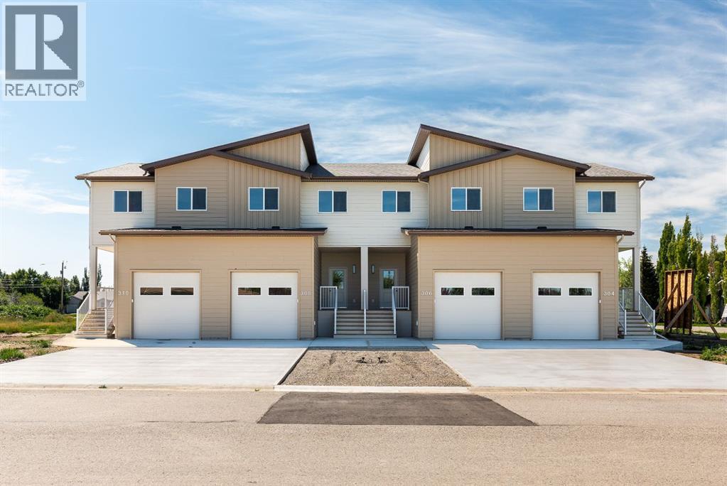 308 S 50 W, Raymond, Alberta  T0K 2S0 - Photo 1 - A2267379