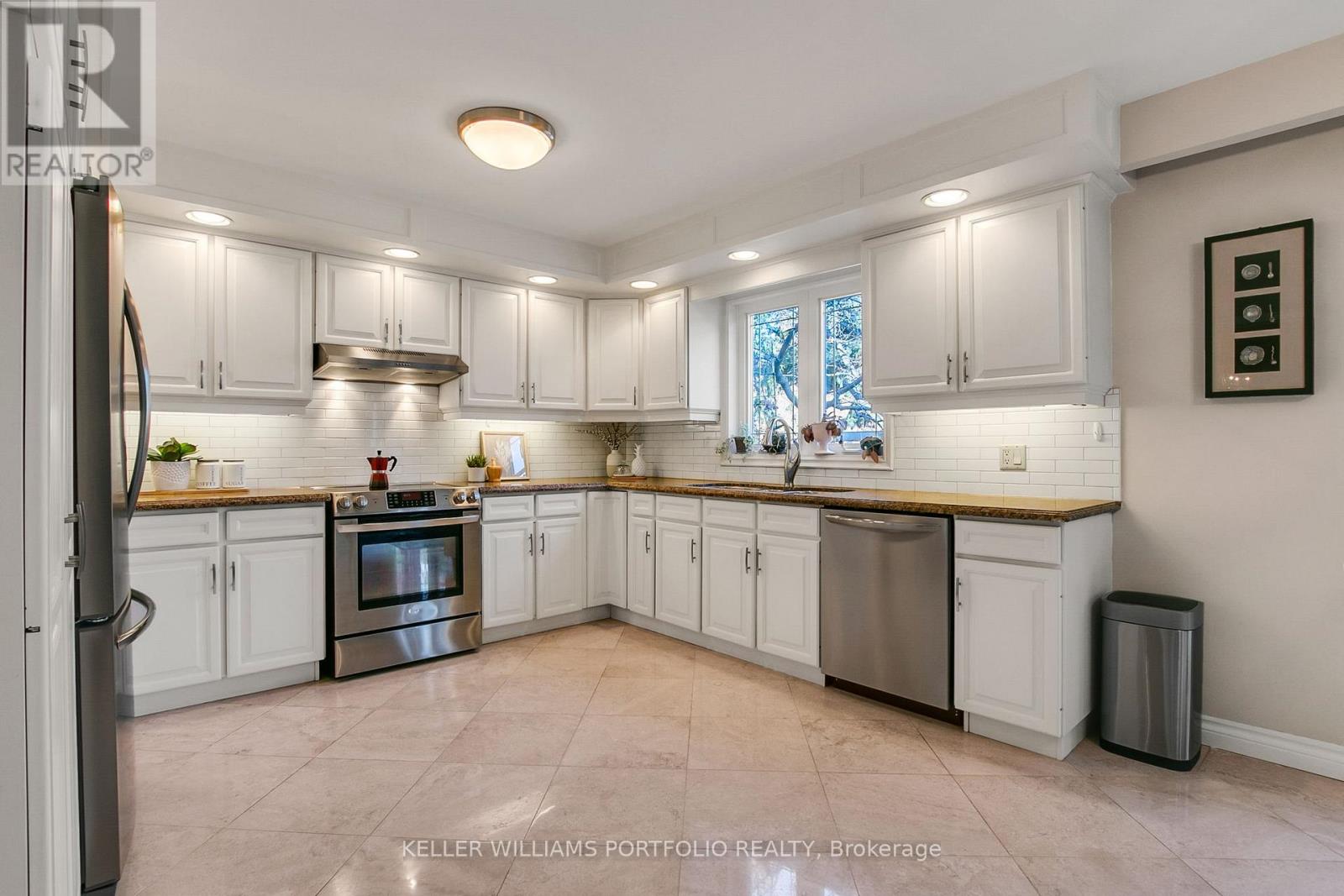 4 Neiltree Court, Toronto, Ontario  M9C 5C3 - Photo 2 - W13090154