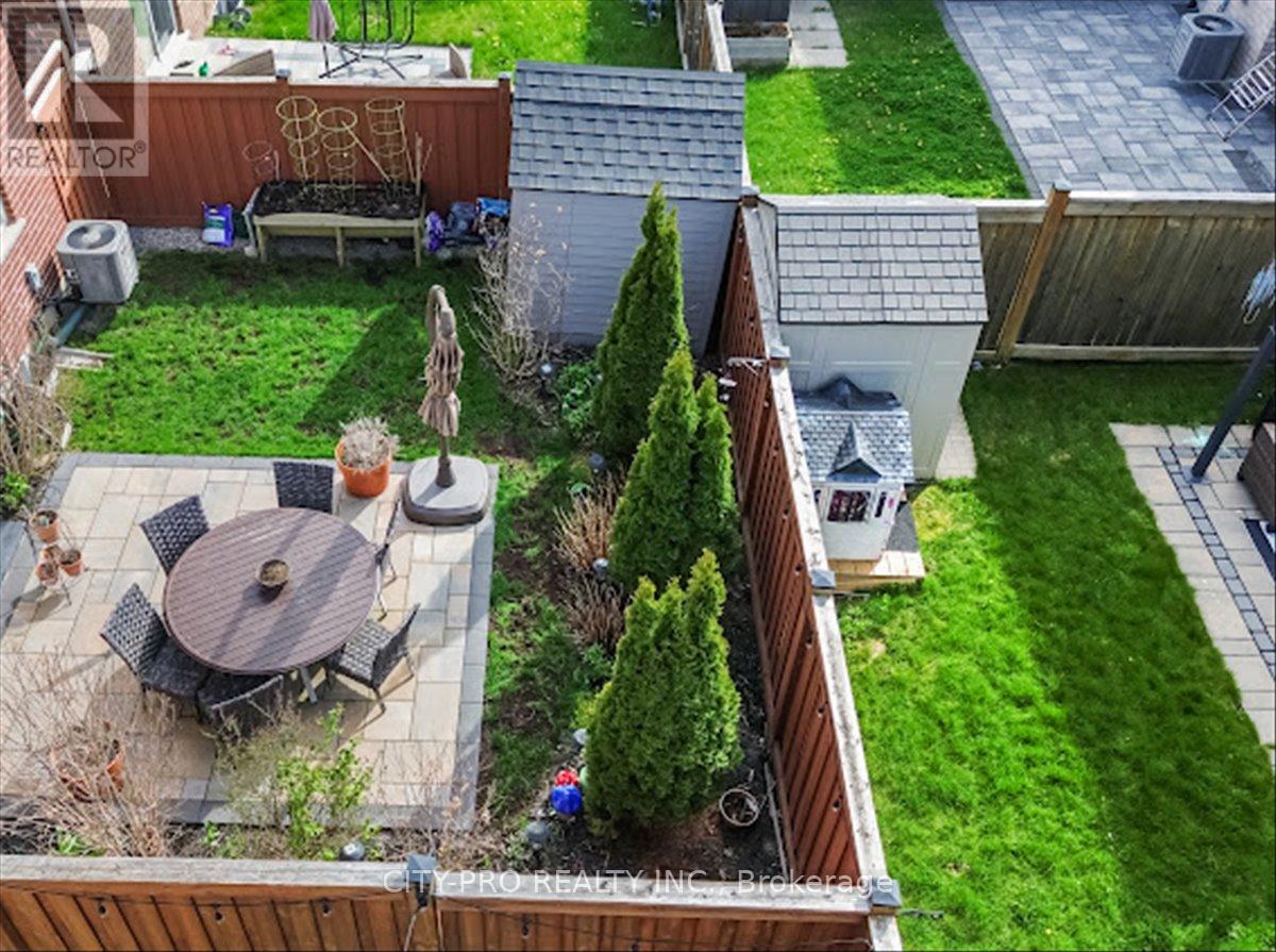 439 Etheridge Avenue, Milton, Ontario  L9E 0B3 - Photo 3 - W13066488