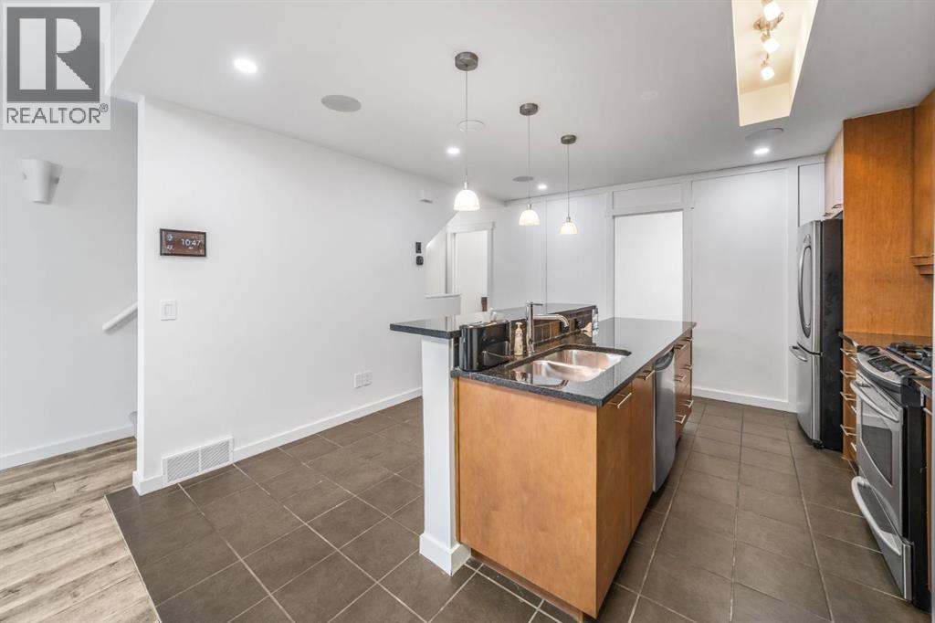 156 9 Street Ne, Calgary, Alberta  T2E 0P4 - Photo 9 - A2287780