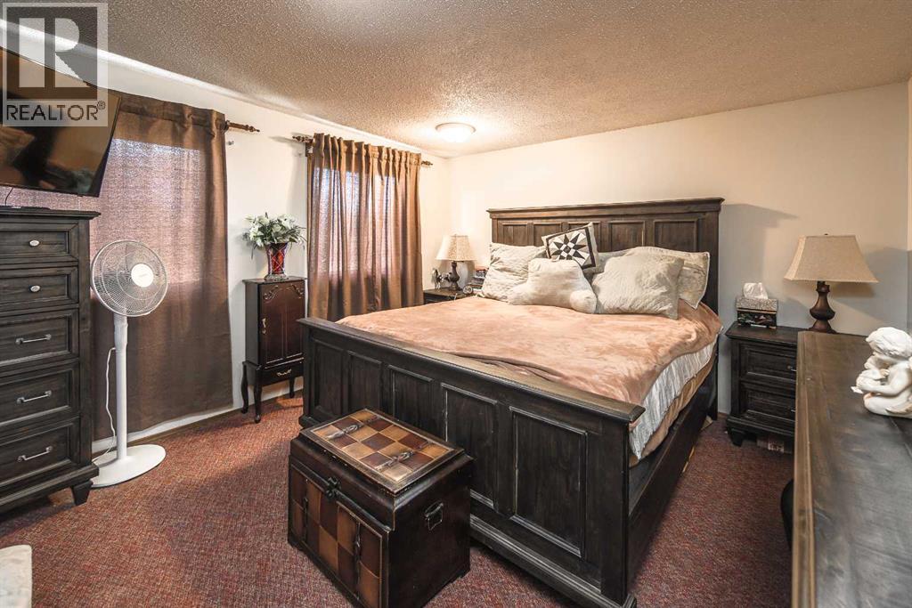 262057 Poplar Hill Drive, Rural Rocky View County, Alberta  T3R 1C7 - Photo 11 - A2308159