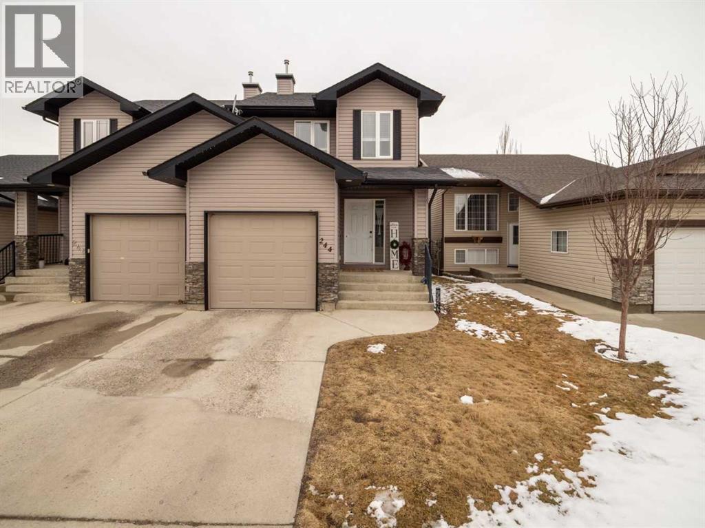 244 Kodiak Boulevard N, Lethbridge, Alberta  T1H 3P6 - Photo 1 - A2294079