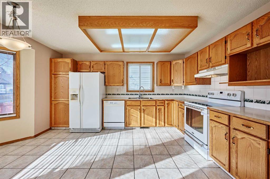 177 Harvest Hills Drive NE, Calgary, Alberta  T3K 3Y1 - Photo 13 - A2286002