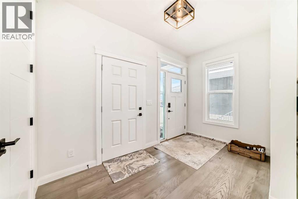 219 Chelsea Park, Chestermere, Alberta  T1X 2T3 - Photo 3 - A2308154