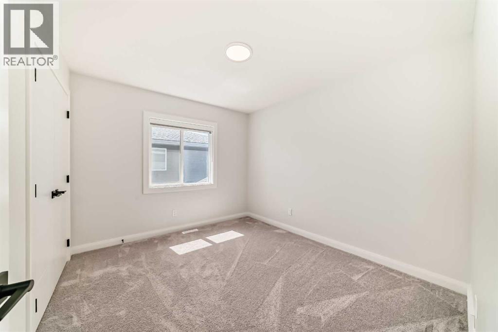 219 Chelsea Park, Chestermere, Alberta  T1X 2T3 - Photo 45 - A2308154
