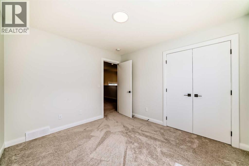 219 Chelsea Park, Chestermere, Alberta  T1X 2T3 - Photo 46 - A2308154