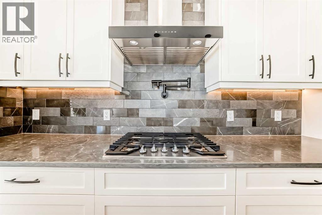 219 Chelsea Park, Chestermere, Alberta  T1X 2T3 - Photo 5 - A2308154