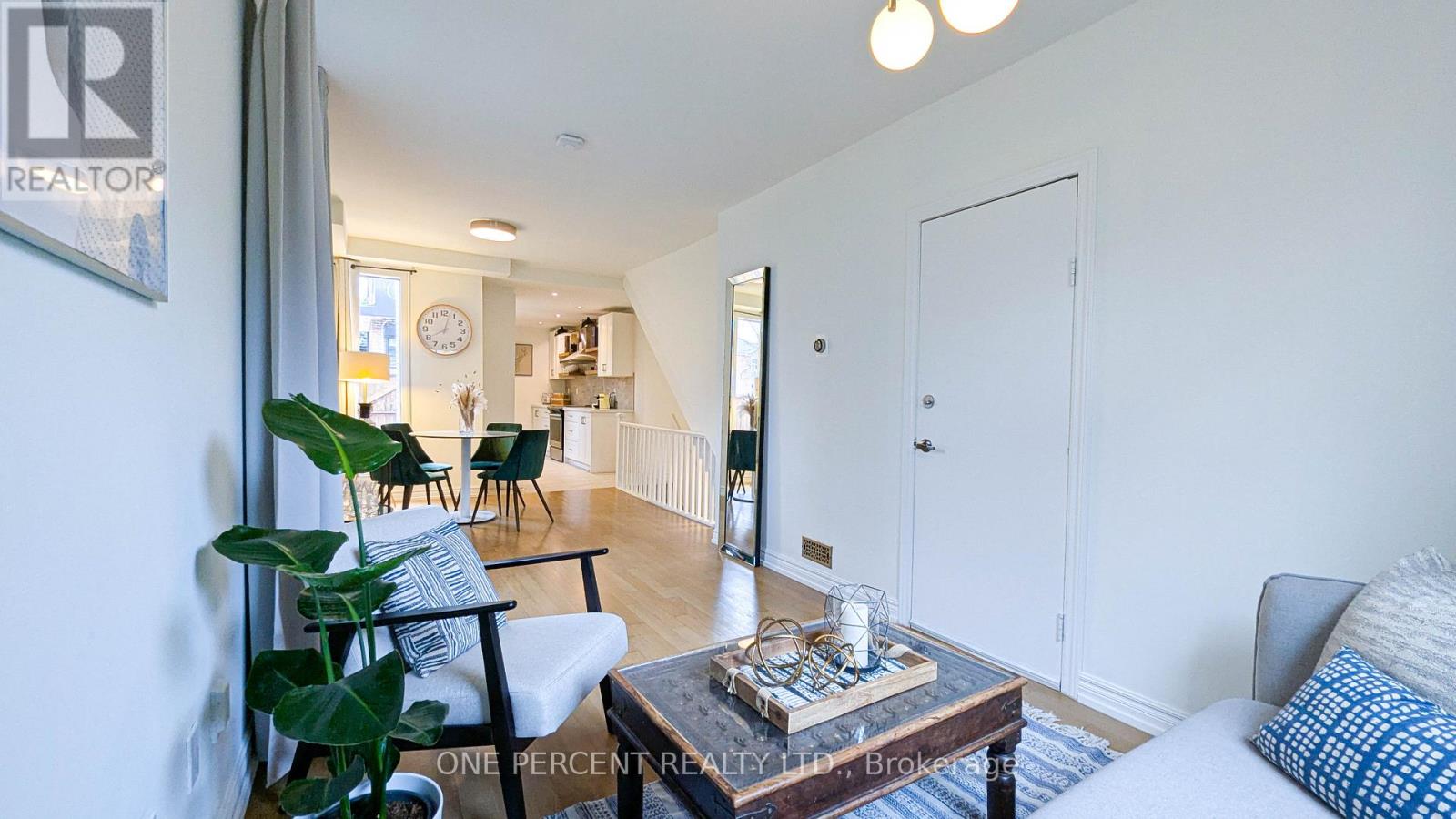 119 De Grassi Street, Toronto, Ontario  M4M 2K5 - Photo 4 - E13091364