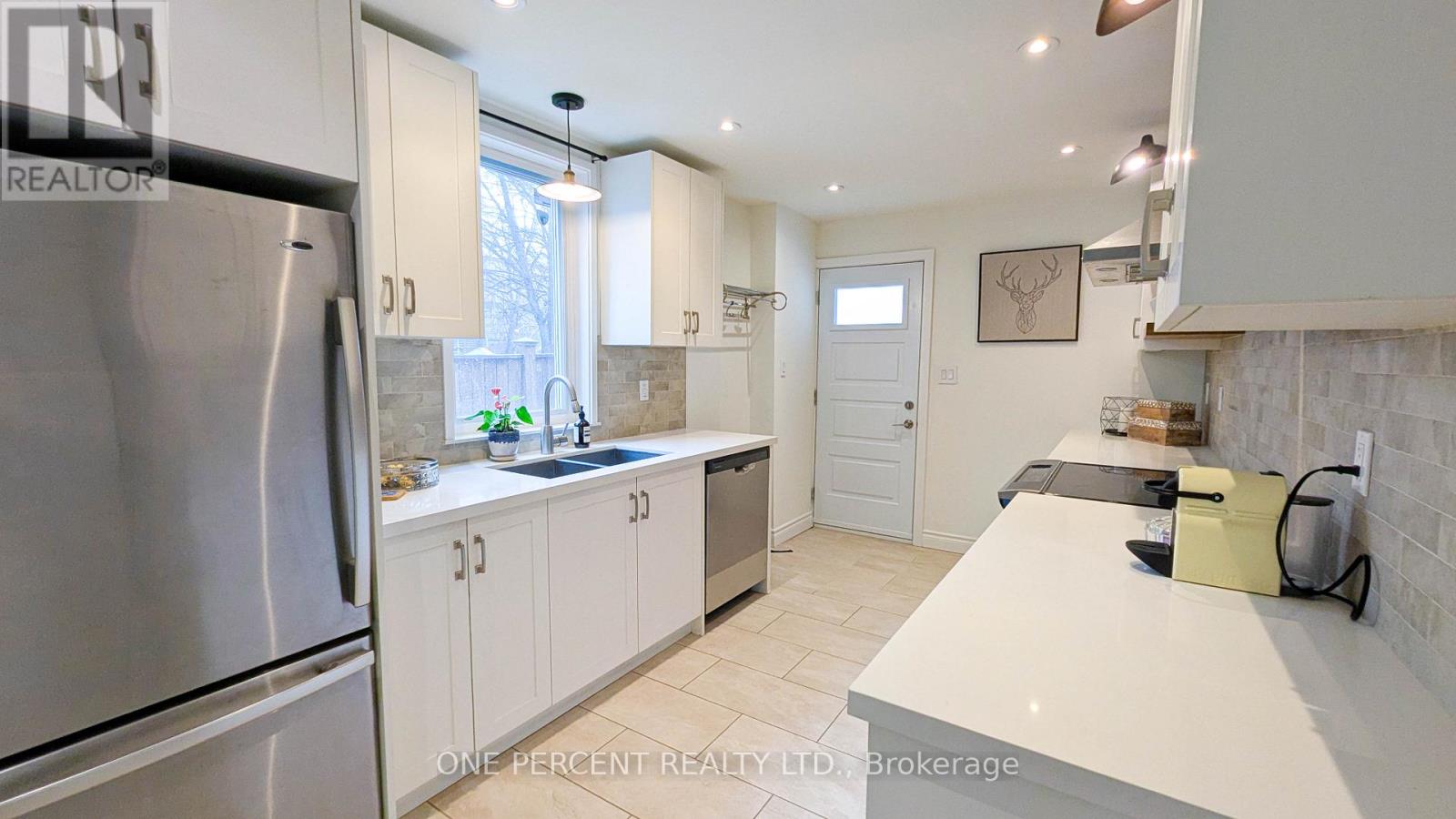 119 De Grassi Street, Toronto, Ontario  M4M 2K5 - Photo 6 - E13091364