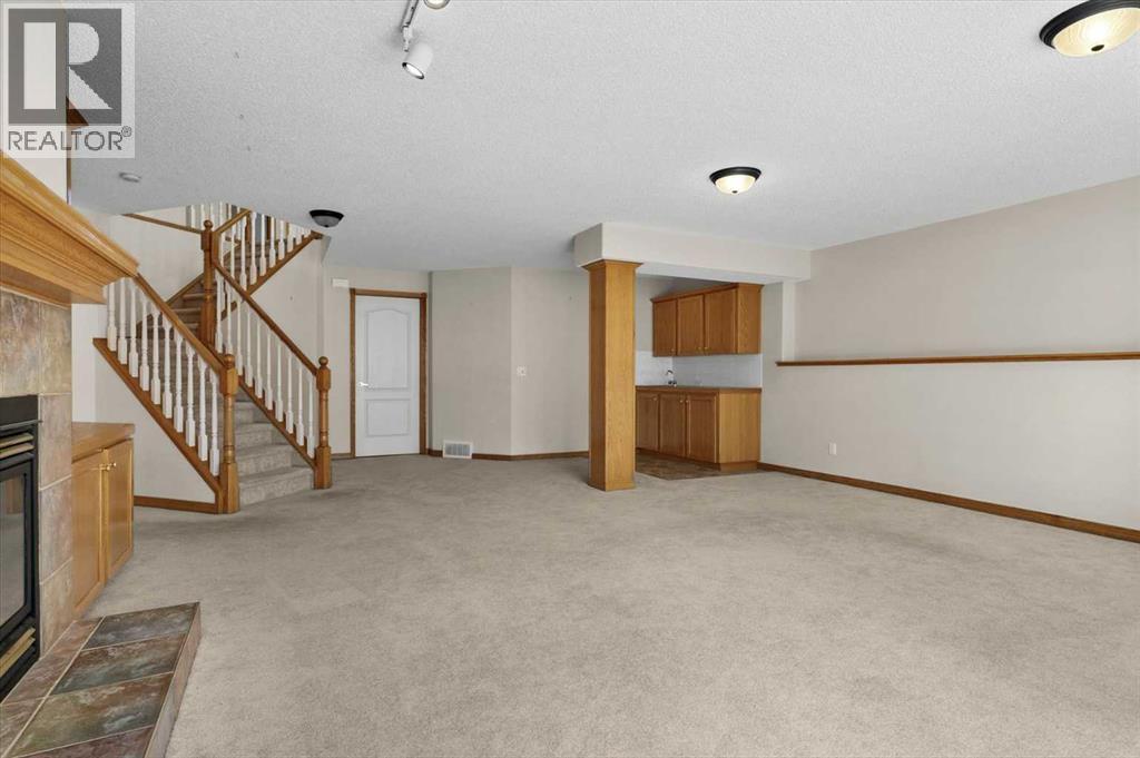 122 Rocky Ridge Villas Nw, Calgary, Alberta  T3G 4R3 - Photo 31 - A2308176