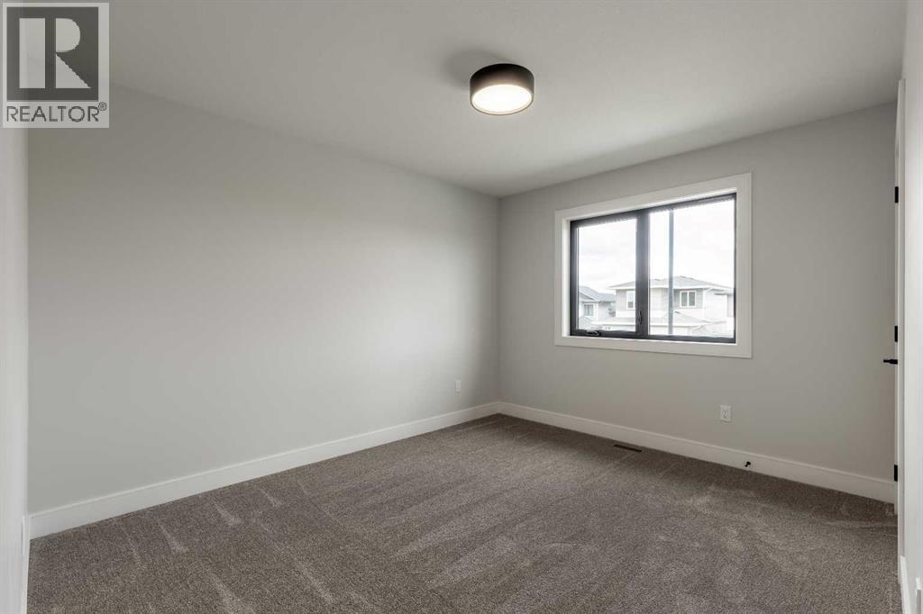 550 Malahat Green W, Lethbridge, Alberta  T1J 5W4 - Photo 24 - A2308136