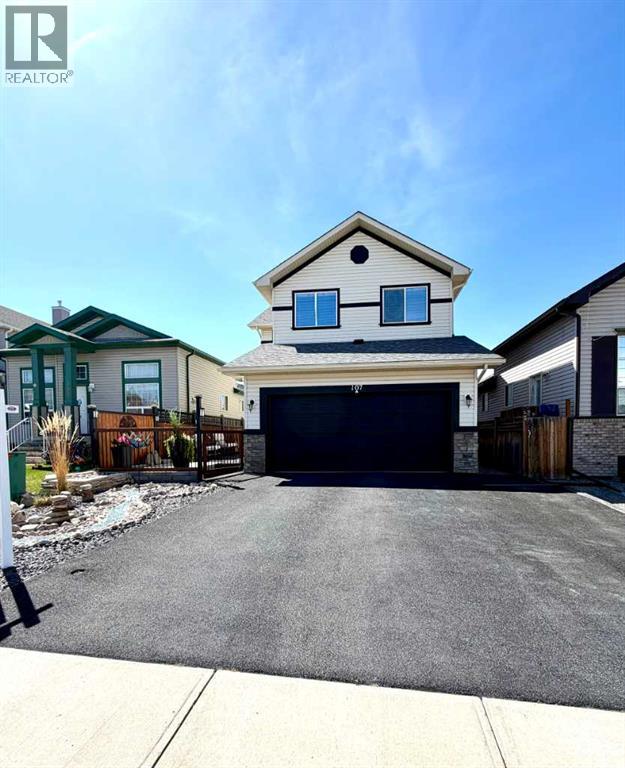 107 Cimarron Grove Circle, Okotoks, Alberta  T1S 2L9 - Photo 2 - A2294347