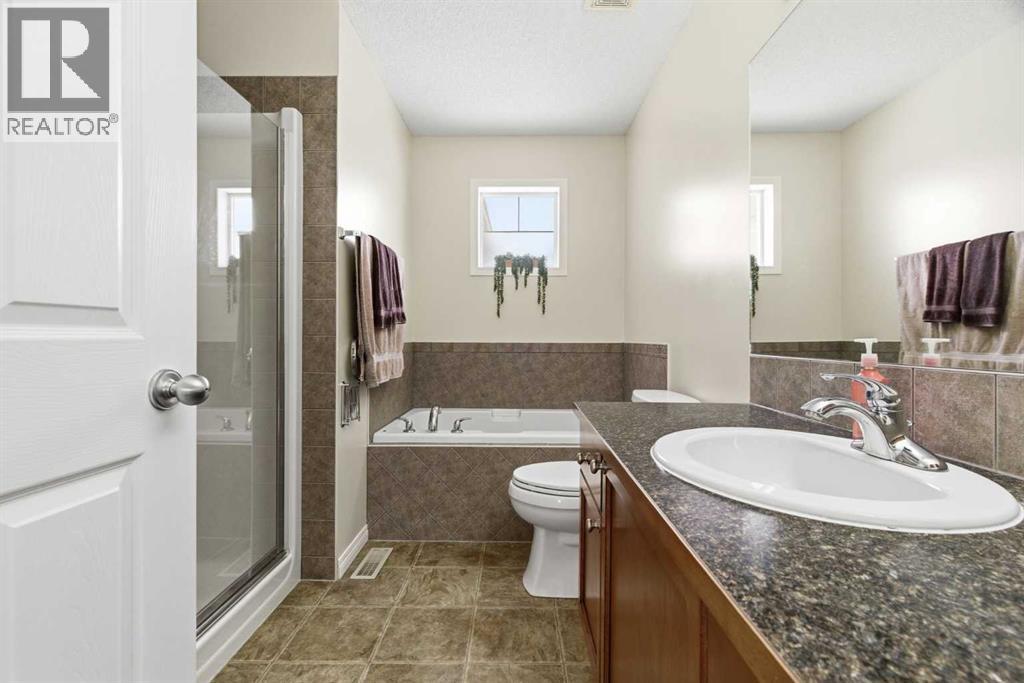 107 Cimarron Grove Circle, Okotoks, Alberta  T1S 2L9 - Photo 24 - A2294347