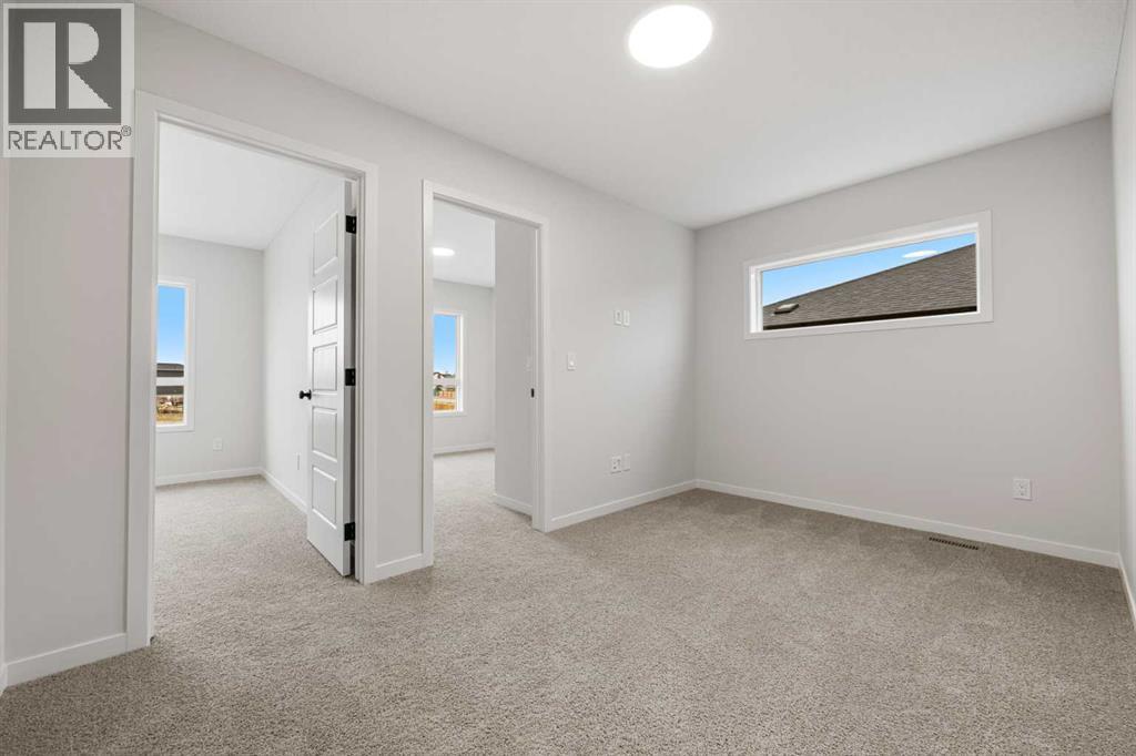 117 Bridgeport Gate, Chestermere, Alberta  T1X 3E5 - Photo 18 - A2285498