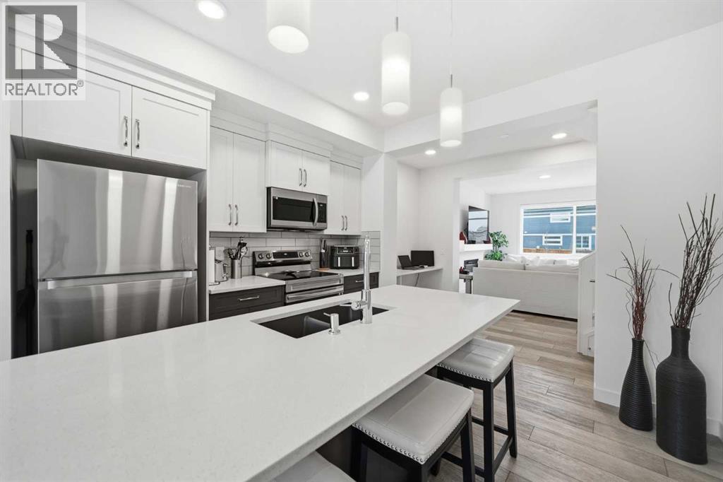 171 Wolf Creek Avenue Se, Calgary, Alberta  T2X 4V1 - Photo 5 - A2308124