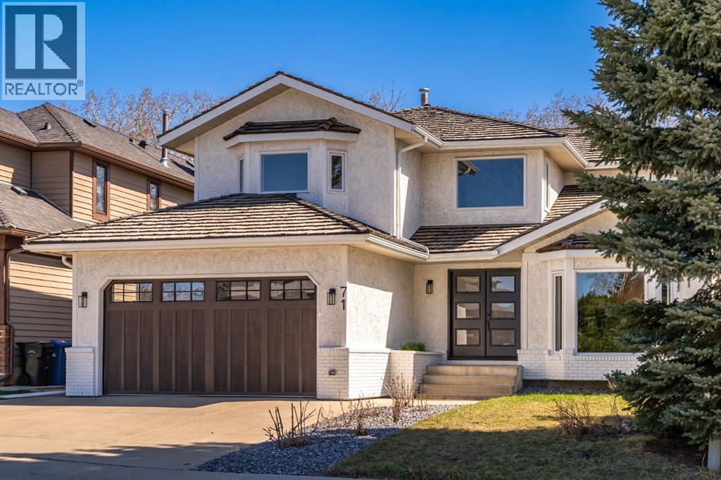 71 Woodridge Close Sw, Calgary, Alberta  T2W 5M2 - Photo 1 - A2307237