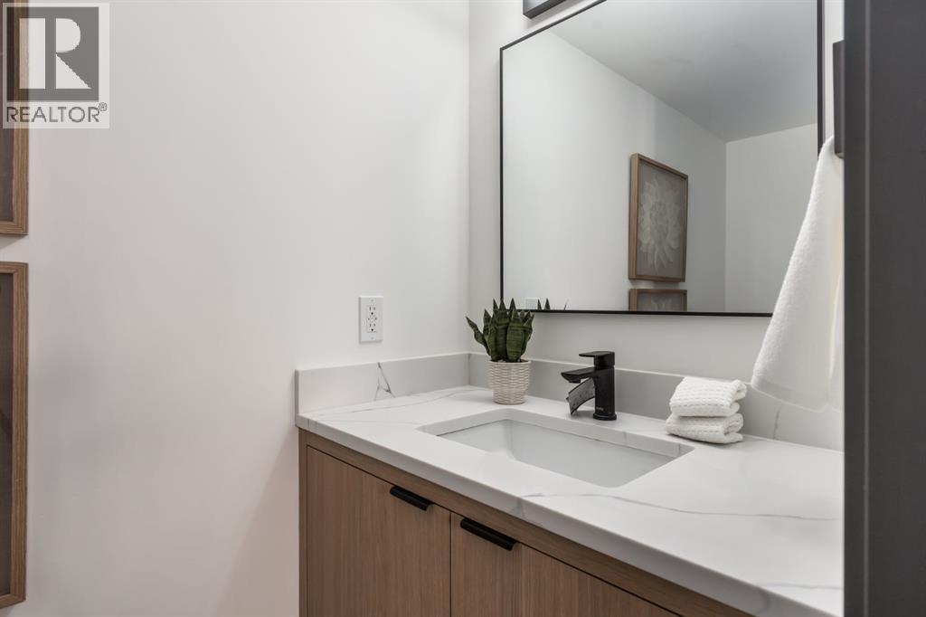 71 Woodridge Close Sw, Calgary, Alberta  T2W 5M2 - Photo 21 - A2307237
