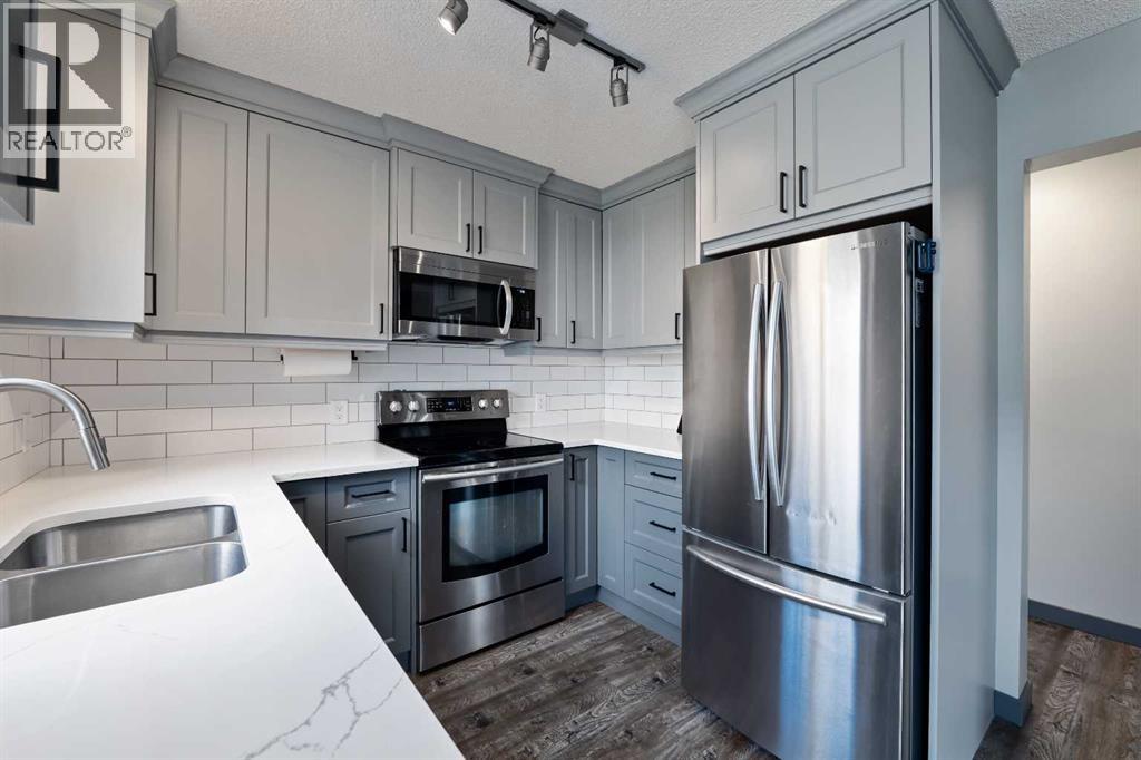11 Woodside Circle, Airdrie, Alberta  T4B 2H8 - Photo 10 - A2306715