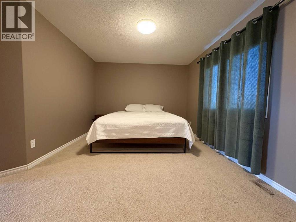9510 Willow Drive, Grande Prairie, Alberta  T8X 0G9 - Photo 24 - A2306595