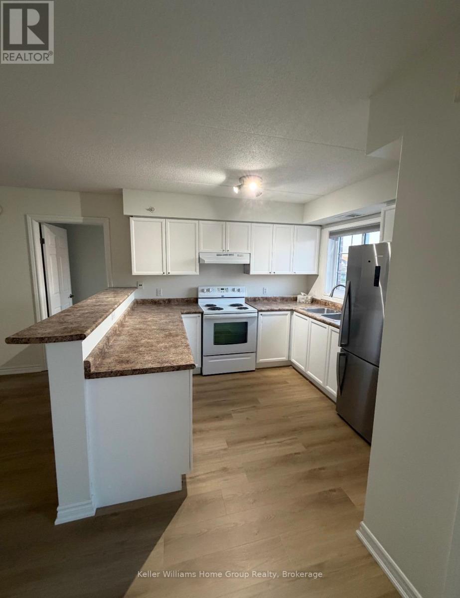 306 - 415 Grange Road, Guelph (Grange Road), Ontario  N1E 0C4 - Photo 2 - X13093446