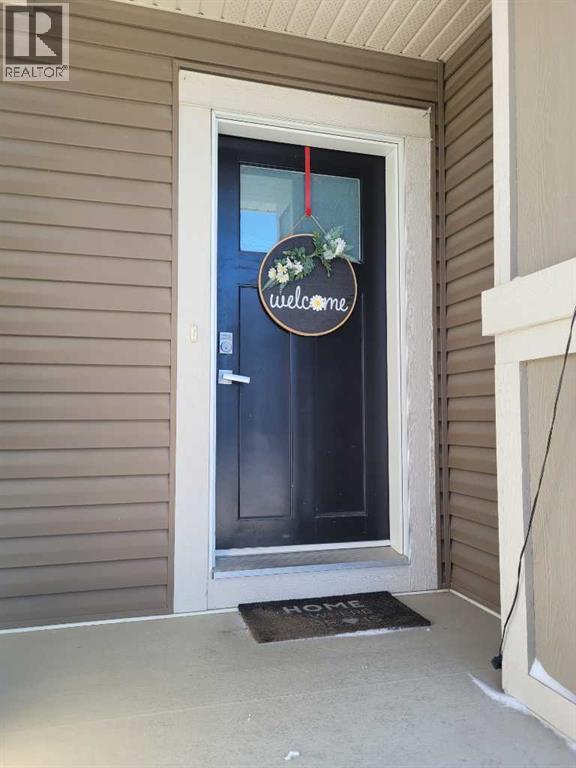 613 Hillcrest Road SW, Airdrie, Alberta  T4B 4C8 - Photo 3 - A2284382