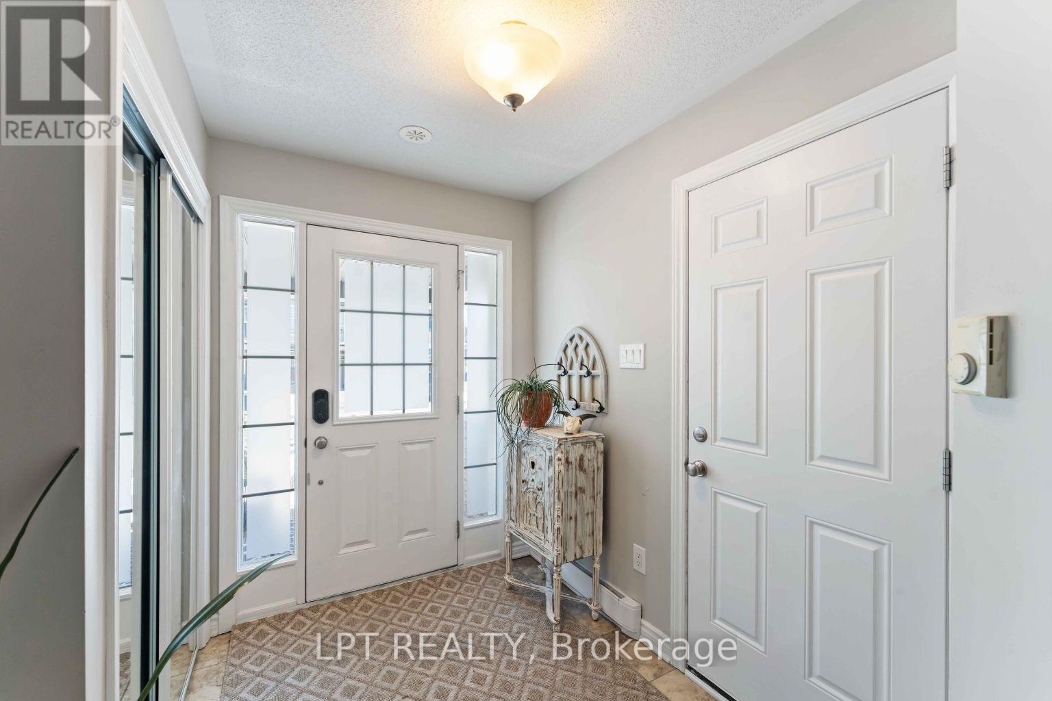 607 Meadowcreek Circle, Ottawa, Ontario  K2M 0J9 - Photo 3 - X12949450