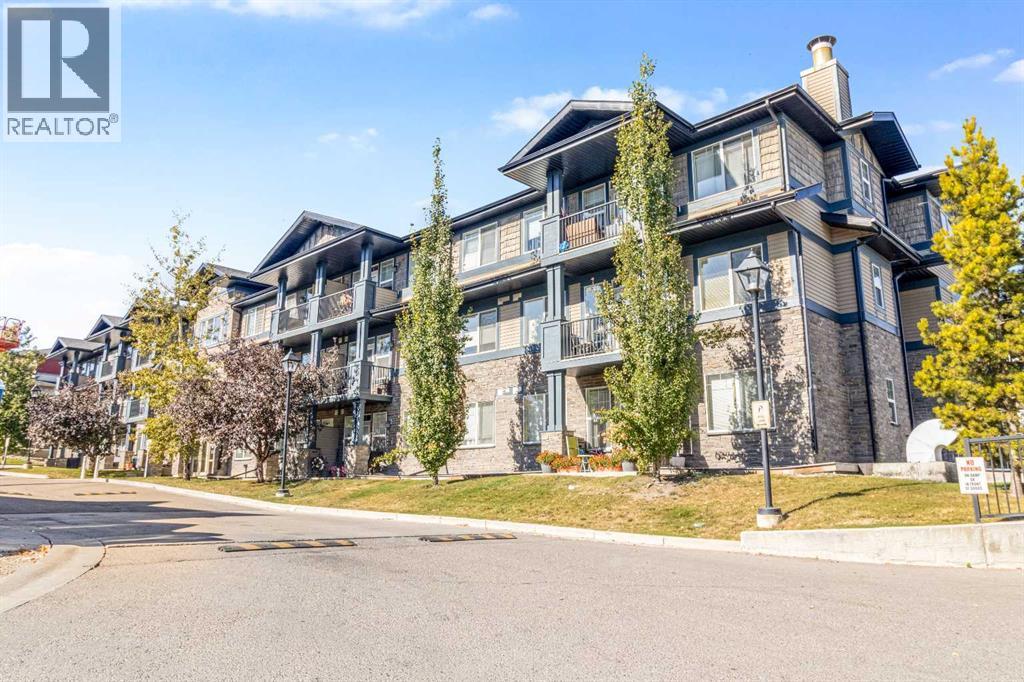 306, 10 Panatella Road Nw, Calgary, Alberta  T3K 0V4 - Photo 1 - A2304829