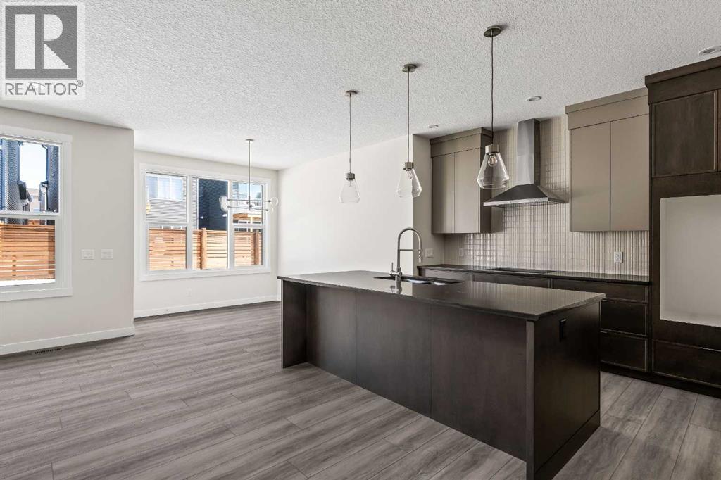 506 Lucas Way Nw, Calgary, Alberta  T3P 2E7 - Photo 3 - A2307462