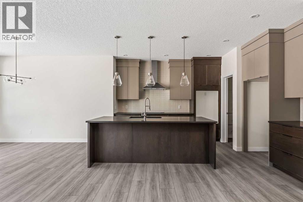 506 Lucas Way Nw, Calgary, Alberta  T3P 2E7 - Photo 4 - A2307462