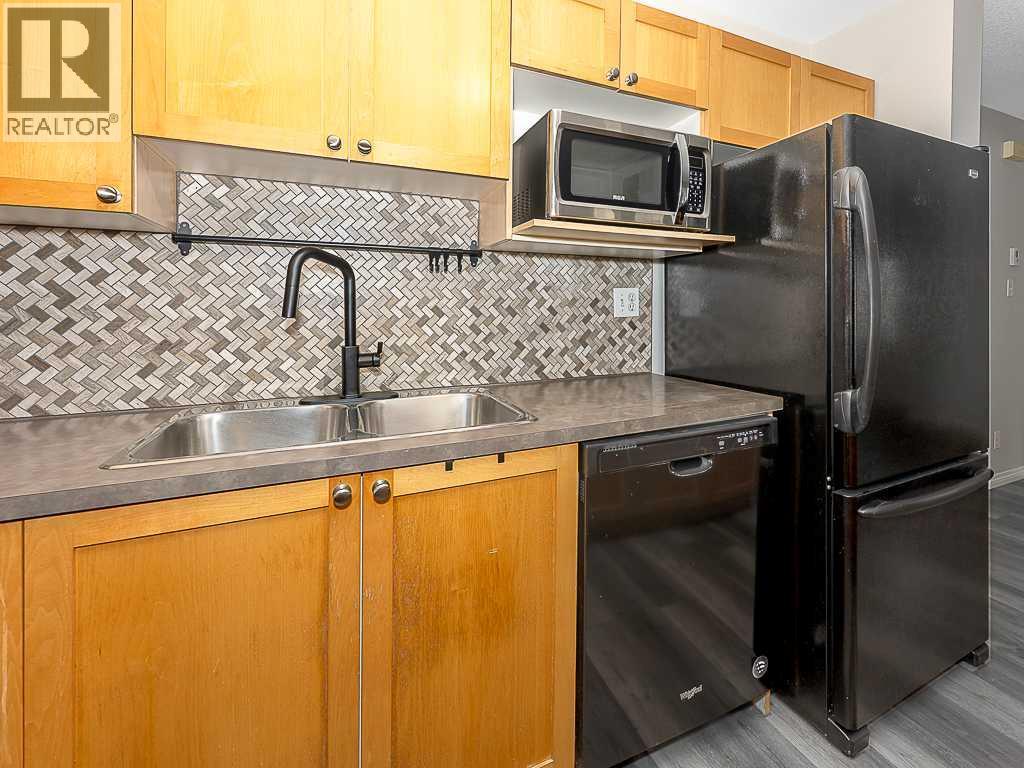 172 Simcoe Place Sw, Calgary, Alberta  T3H 4T7 - Photo 9 - A2306968