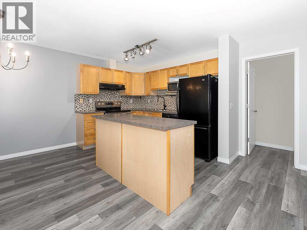 172 Simcoe Place Sw, Calgary, Alberta  T3H 4T7 - Photo 6 - A2306968