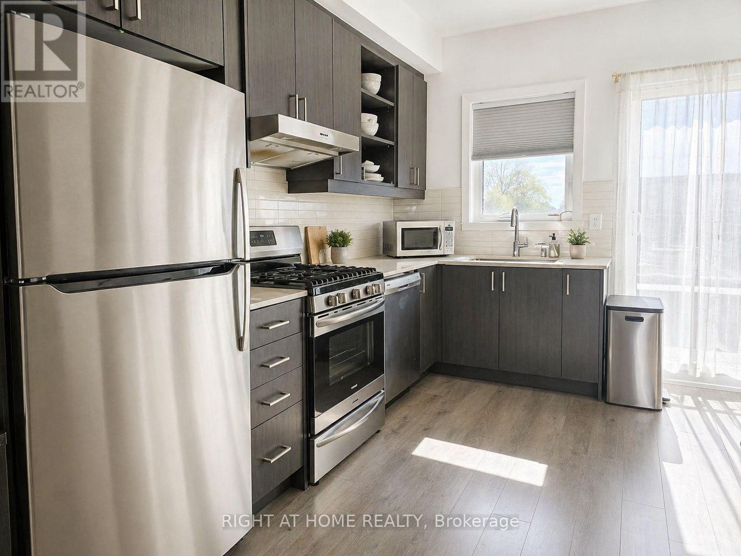 74 Stanley Greene Boulevard, Toronto, Ontario  M3K 0C8 - Photo 2 - W13094068