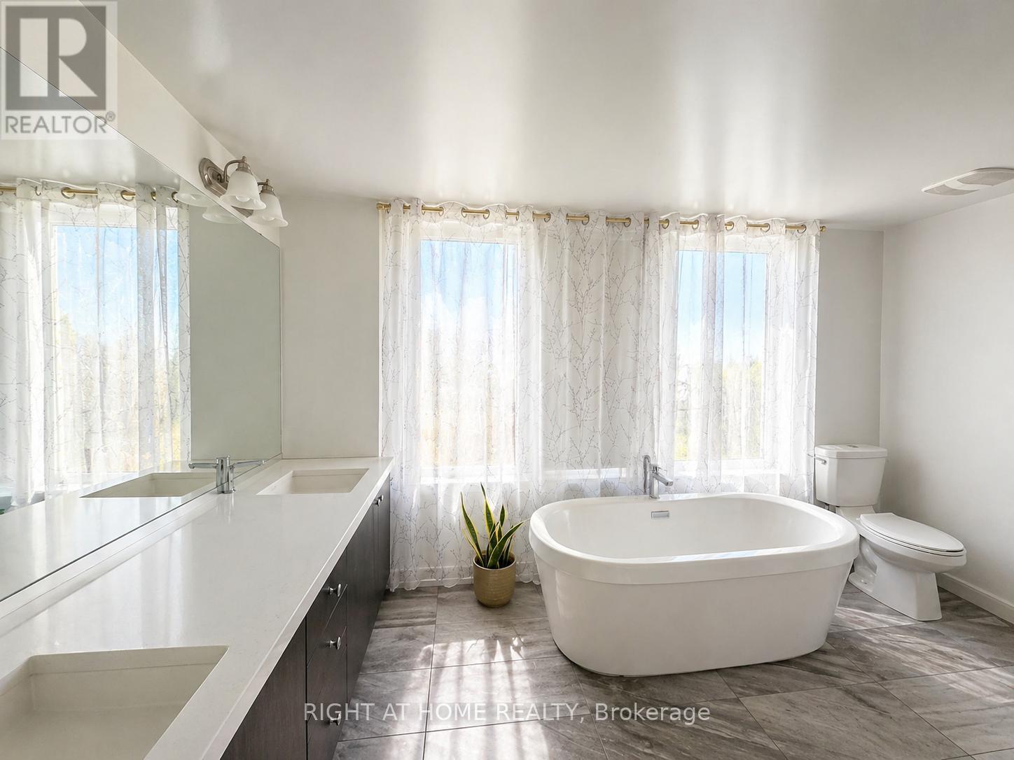 74 Stanley Greene Boulevard, Toronto, Ontario  M3K 0C8 - Photo 5 - W13094068