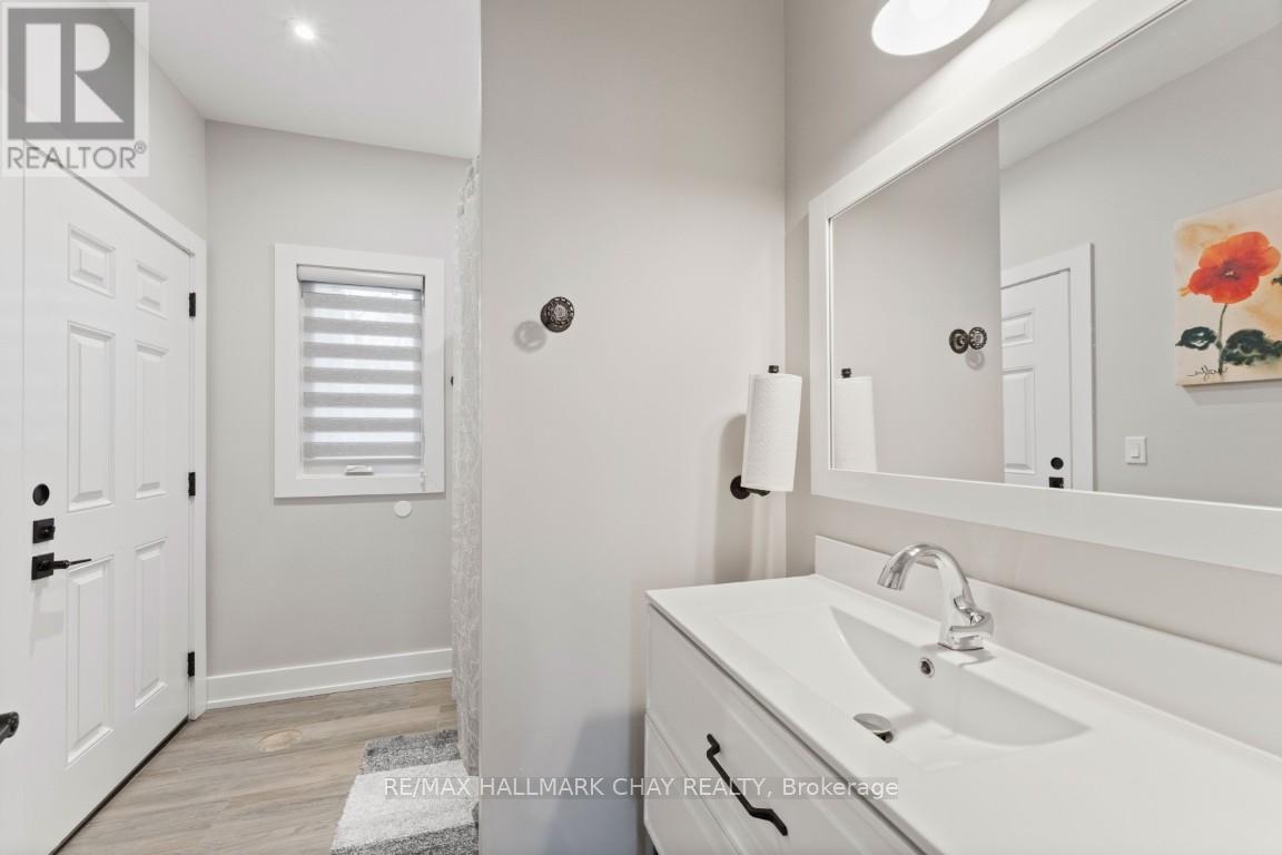 18 Lawrence Avenue, Springwater, Ontario  L9X 0W3 - Photo 24 - S13094182