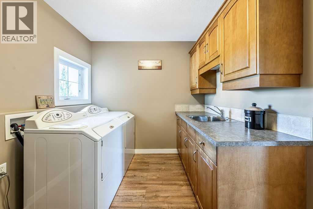 51 Norris Coulee Trail, De Winton, Alberta  T1S 5A5 - Photo 22 - A2267806