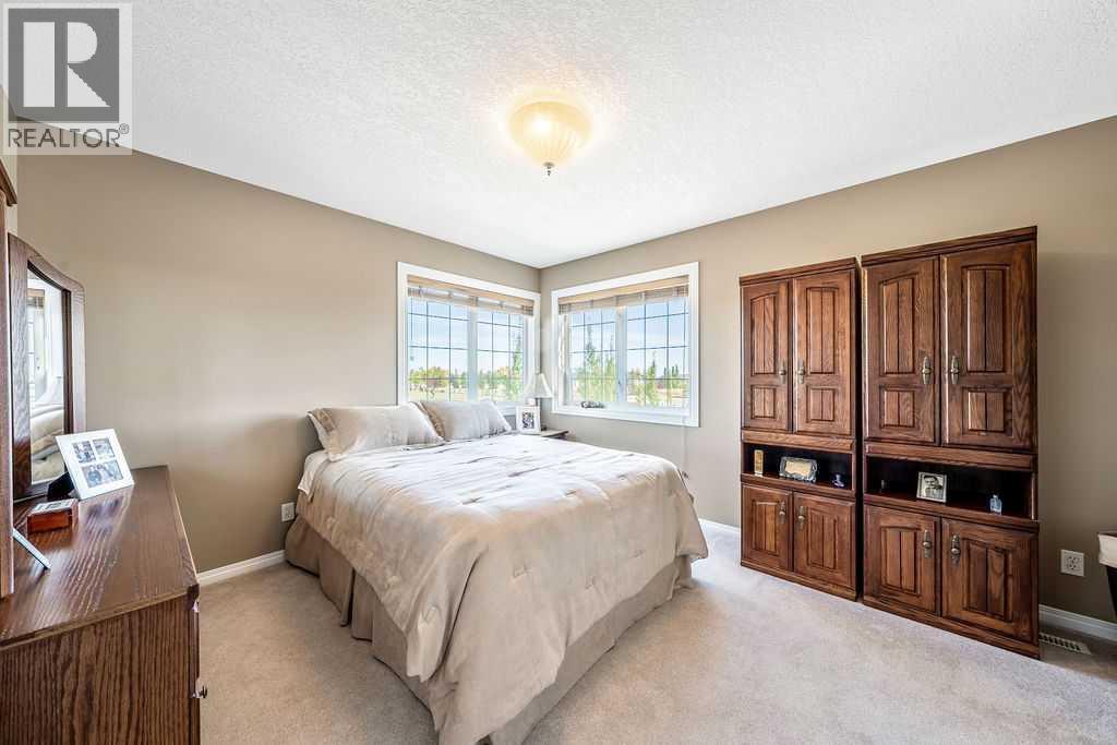 51 Norris Coulee Trail, De Winton, Alberta  T1S 5A5 - Photo 29 - A2267806